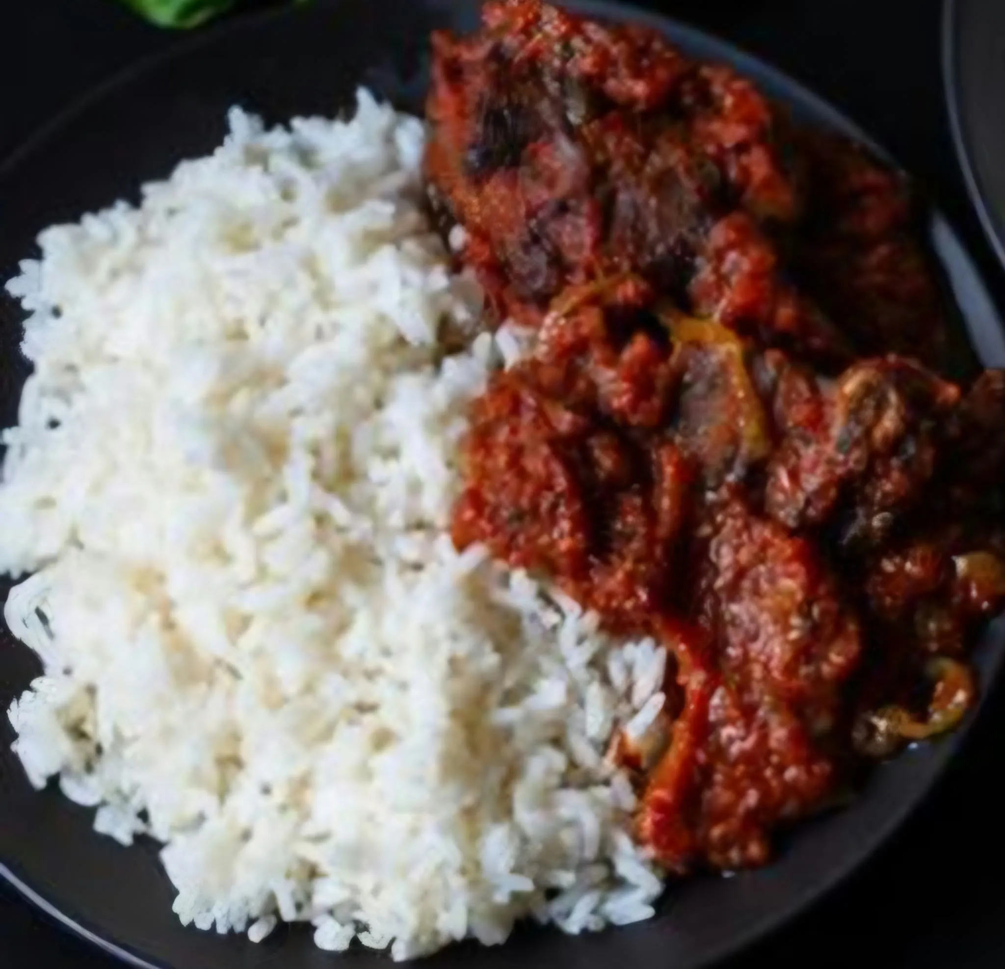 White rice served with Ayoke sauce